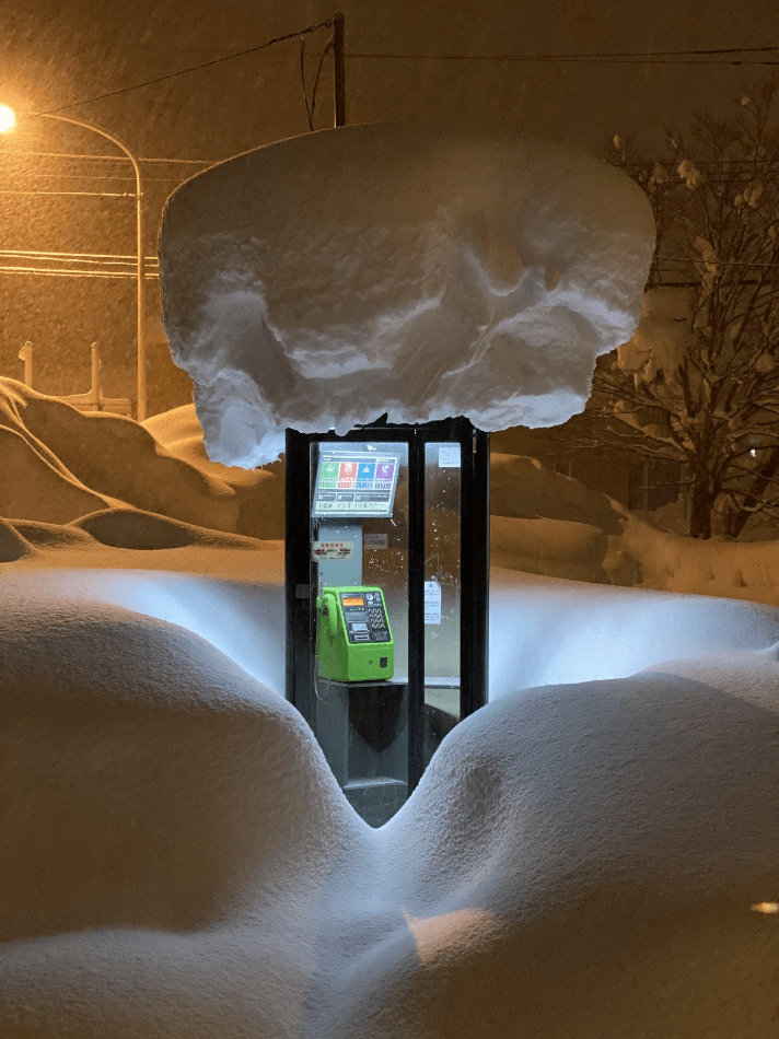 Comforting thought: Night is the original place where we all come from phone booth snow night