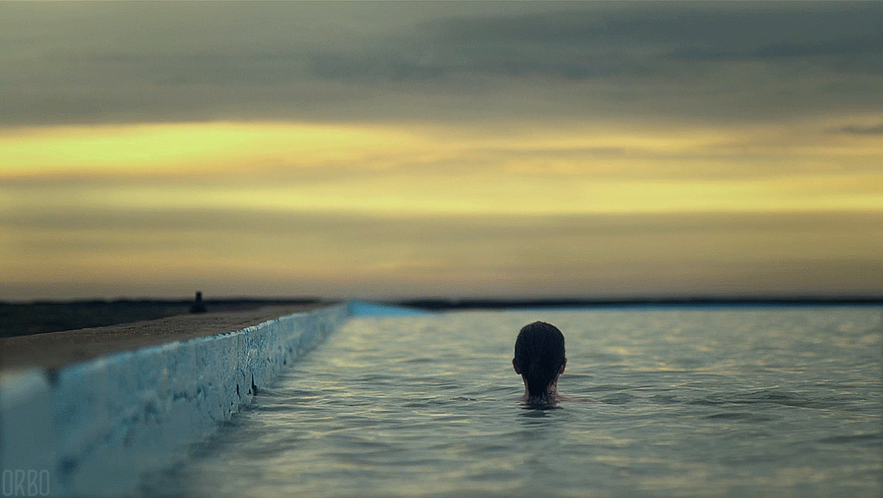 Shy beauty gif reflection sea