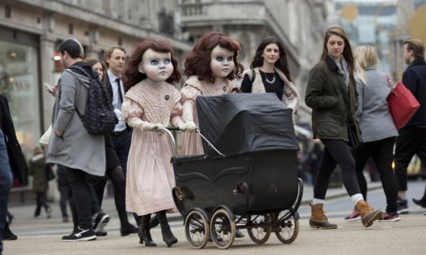 Creepy doll twins freak people out in Central London