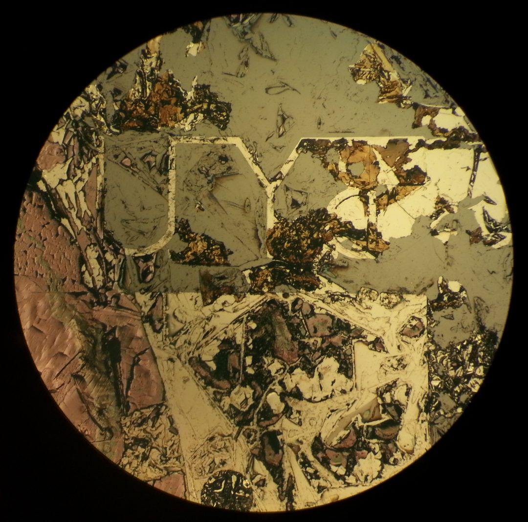 Oxidised metal films photographed using a microscope and an Amazon Fire phone by Reddit user Friz Face.