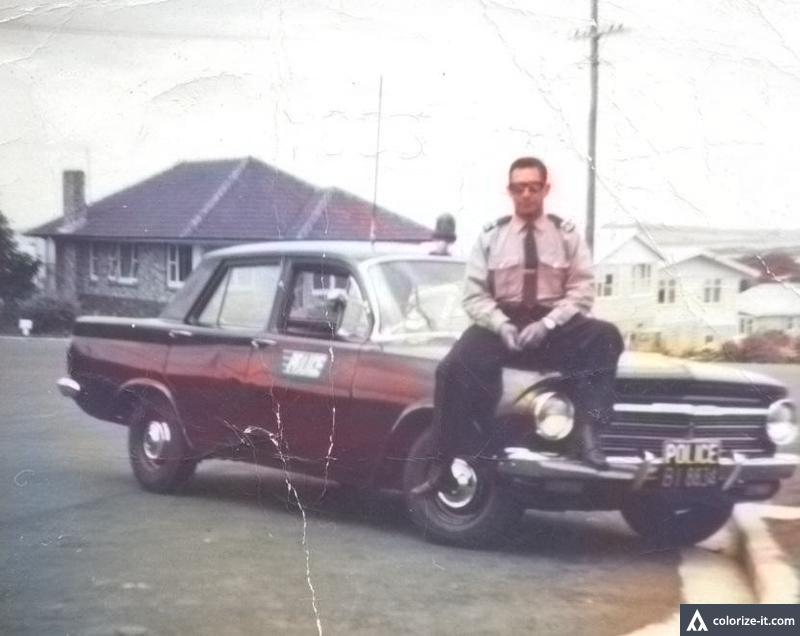 My grandfather as a young Policeman in Panmure, Auckland, early 60's - Coloured by AI