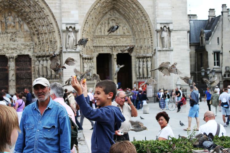 Every Picture Tells a Story: Boy Outside of Notre Dame Cathedral 