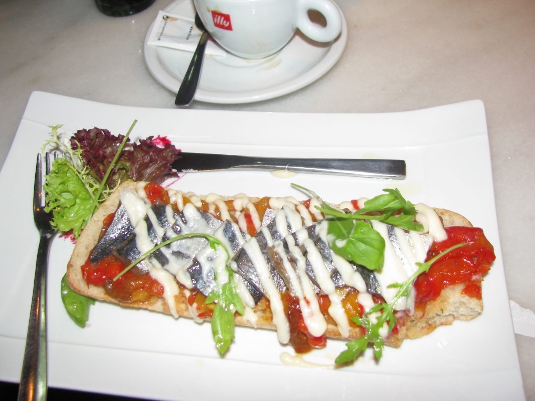 Tapas of bread with fresh sardines, basil, cheese and tomatoes in Madrid, what I actually remember from the palace tour. Copyright Content Catnip 2009