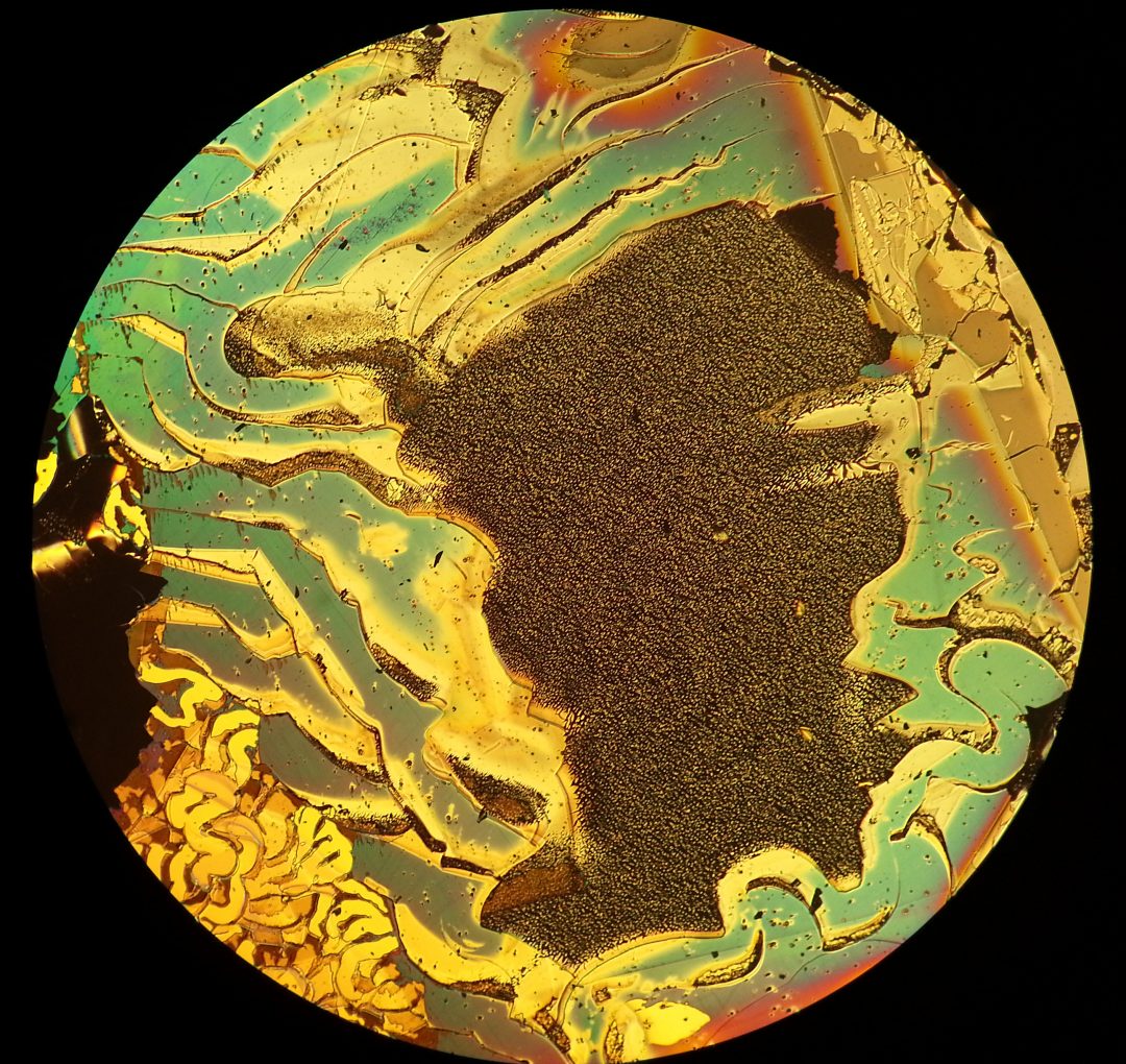 Oxidised metal films photographed using a microscope and an Amazon Fire phone by Reddit user Friz Face.