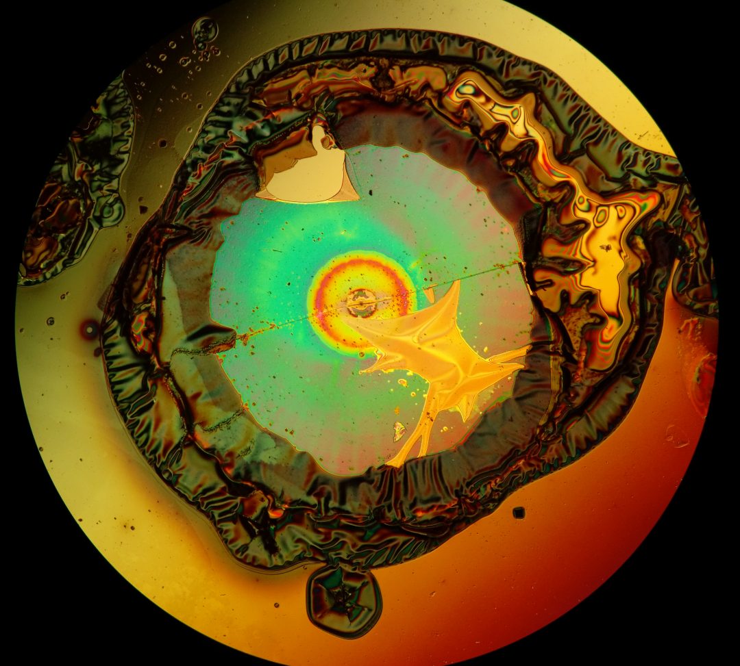 Oxidised metal films photographed using a microscope and an Amazon Fire phone by Reddit user Friz Face.