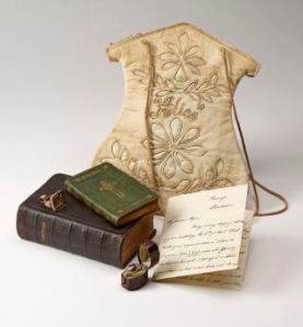 Alice Liddel's purse, praryer books, ring and letter, Imaged as a group AAH 382, PML 352188, PML 352189, PML 352301, AAH 383, PML 352302, MA 6348