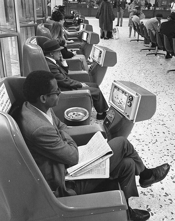 Every picture tells a story: waiting on a bus in the olden days