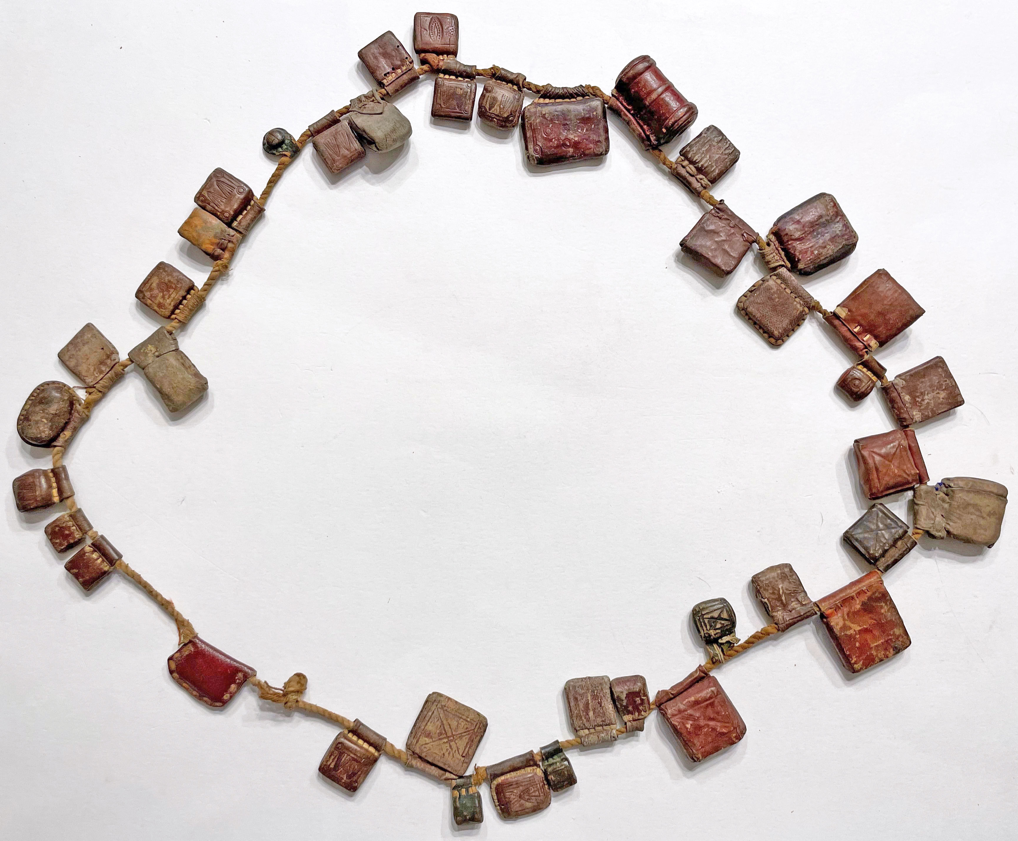 Tiny and enchanting book necklaces from 19th century Ethiopia