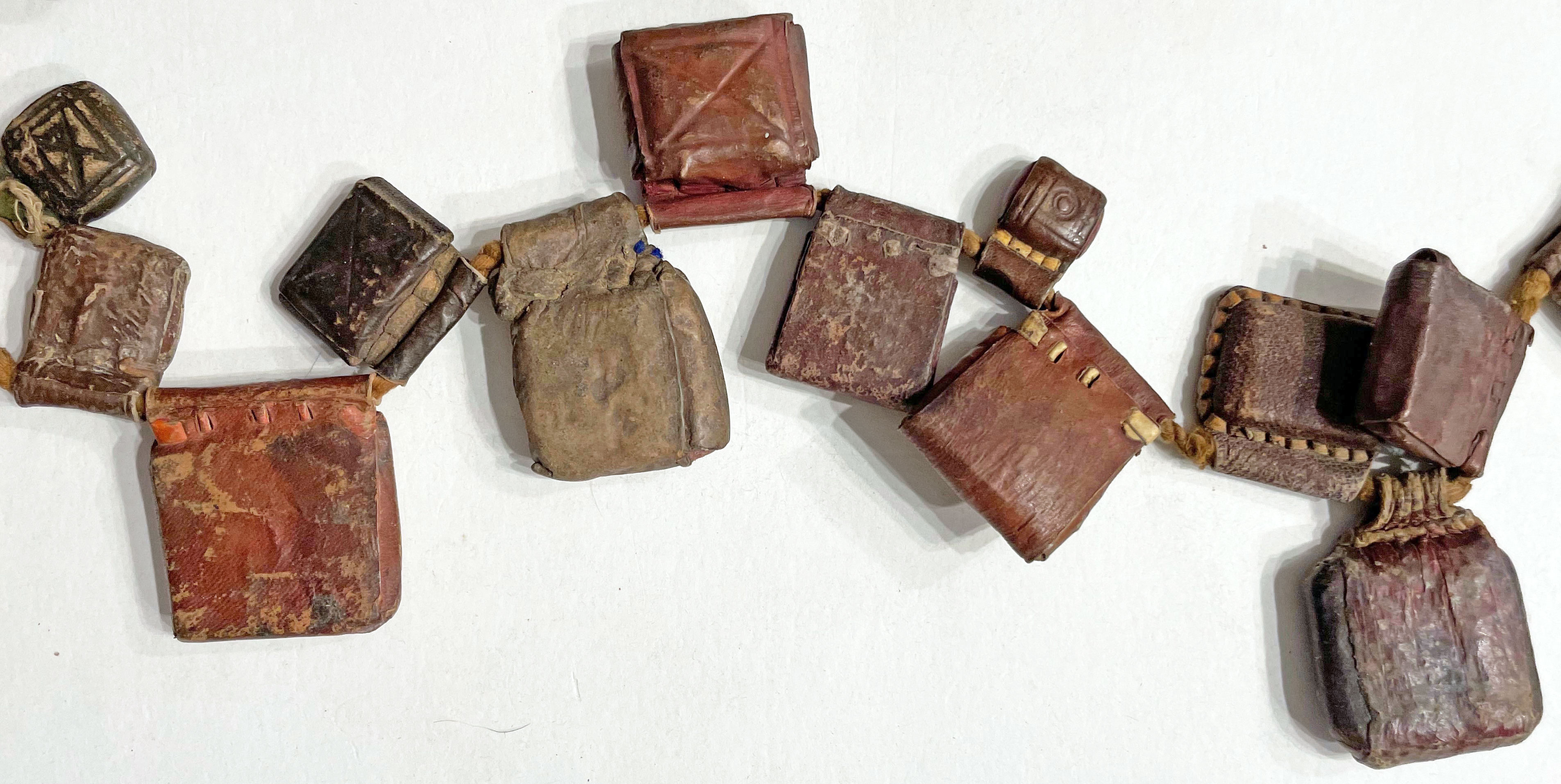 Tiny and enchanting book necklaces from 19th century Ethiopia