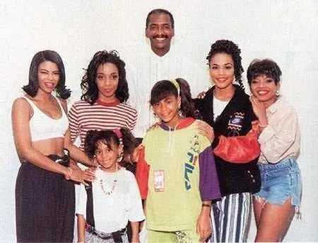 Beyonce as a young girl gets her photo taken with the pop group En Vogue in the early 90's