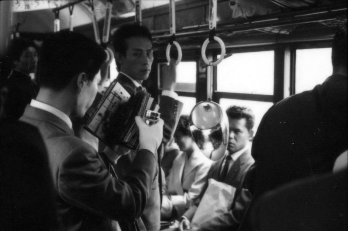 A man alone in a tram - Japan sad lonely depressed