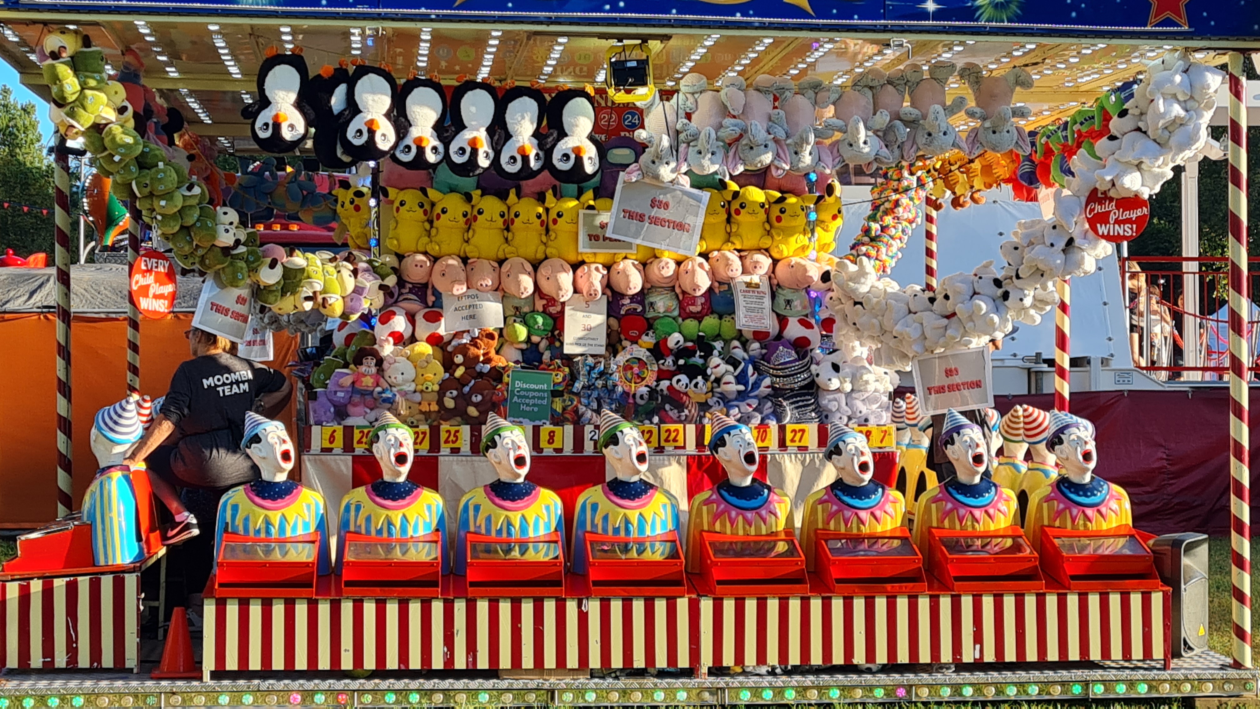 A stall of laughing creepy clowns at Melbourne's Moomba festival